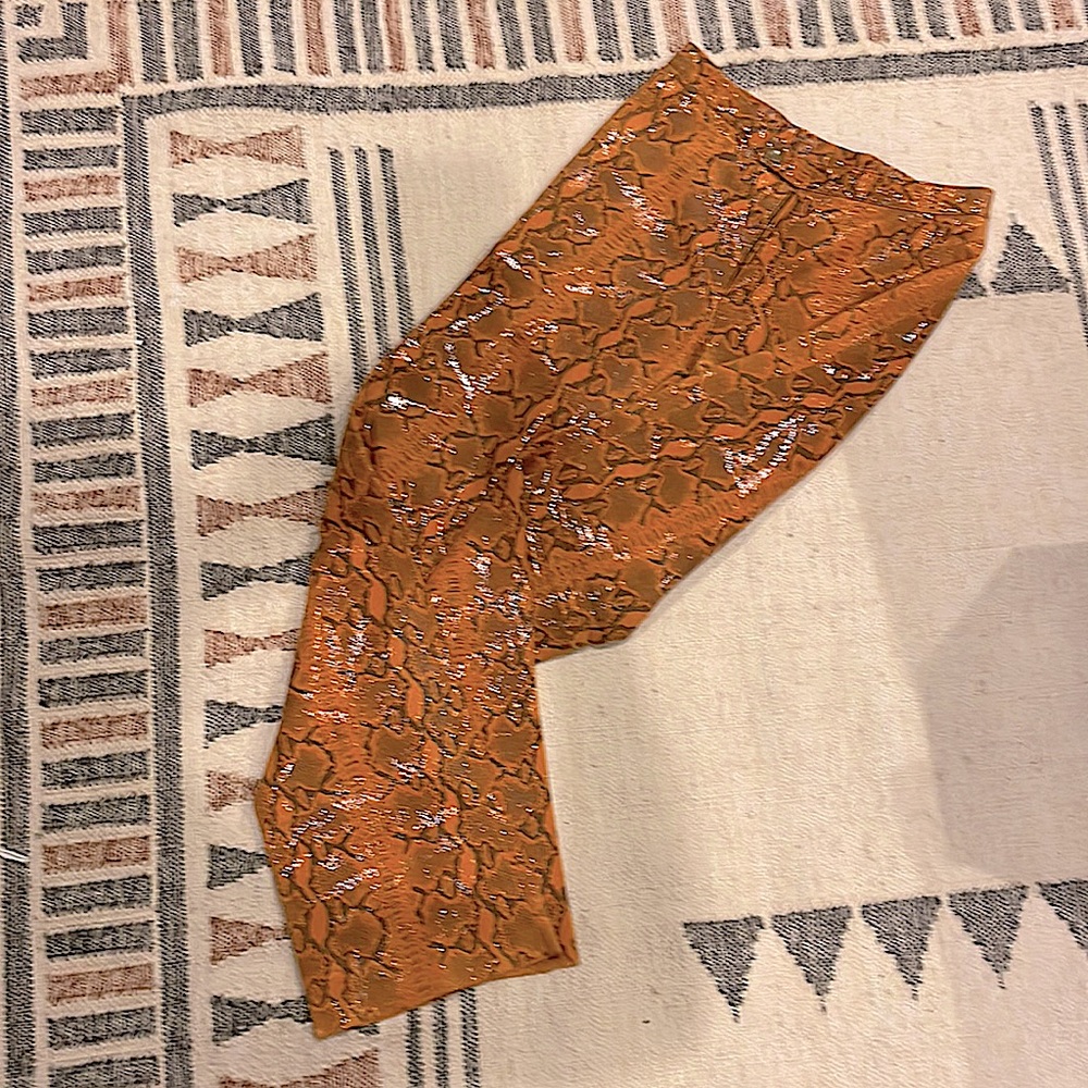 Snake printed leather pants.Size 12 but it does run slim  woman’s size 10